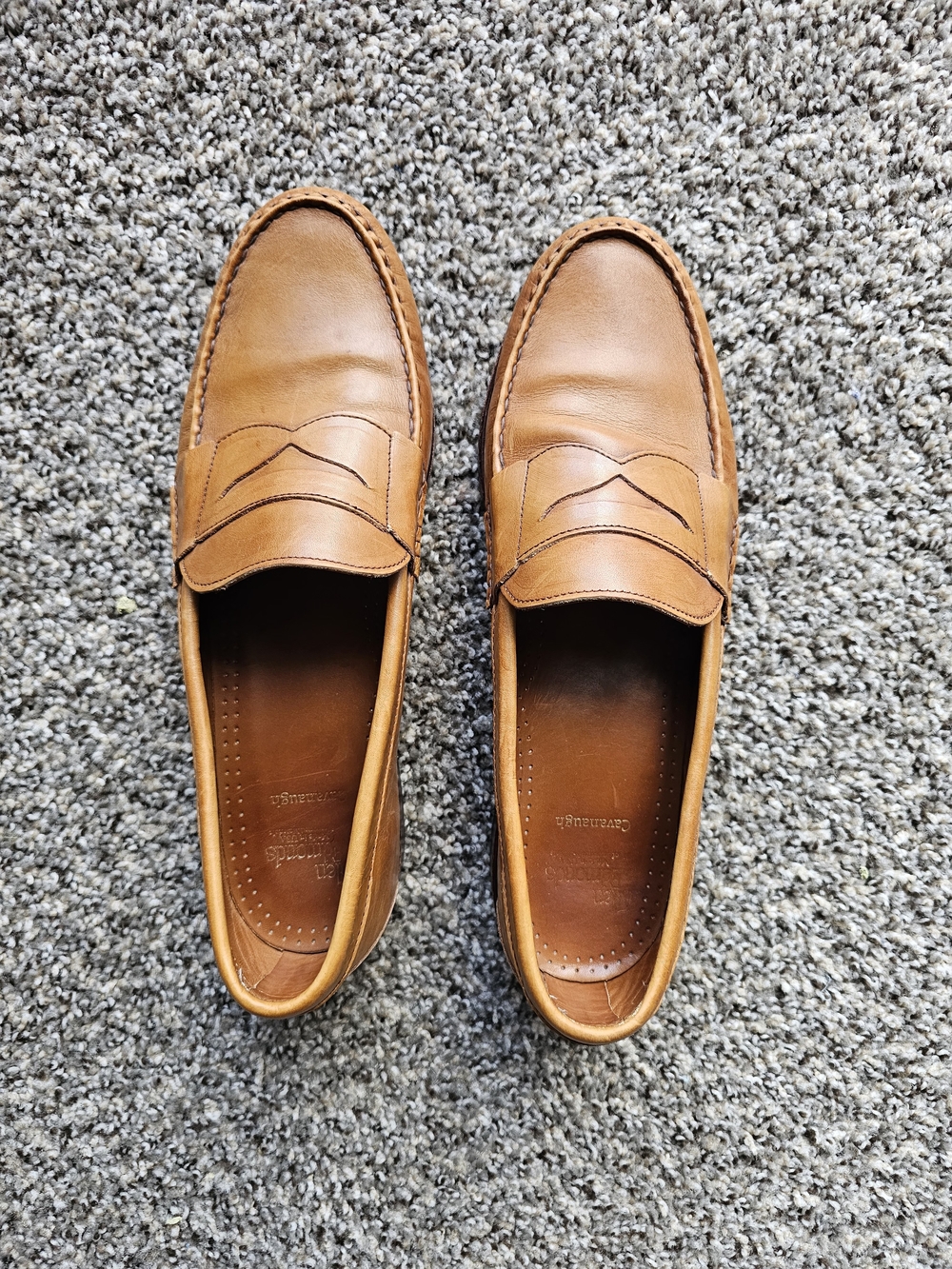 Allen Edmonds Cavanaugh leather penny loafers in a walnut tan color.